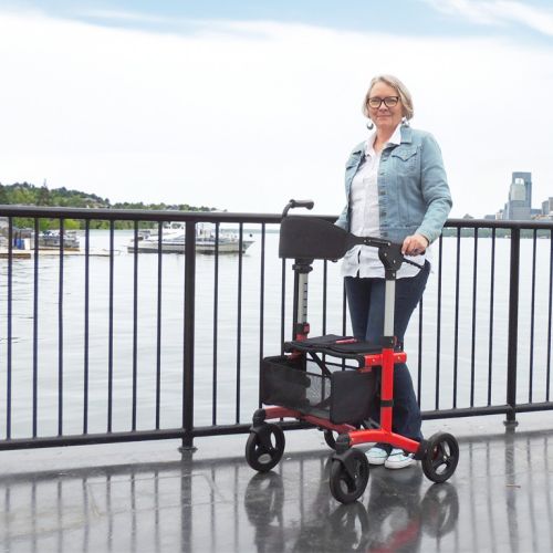 A senior uses a rollator in Ottawa supported by mobility aids from Core Medical Equipment.