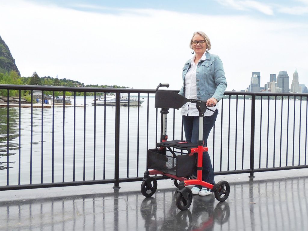 A senior uses a rollator in Ottawa supported by mobility aids from Core Medical Equipment.