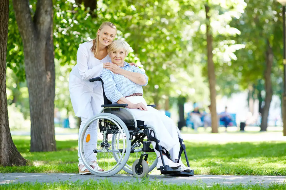 A caregiver assists a senior in a wheelchair in Ottawa, where Core Medical Equipment provides mobility equipment for seniors and healthcare needs.